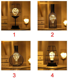 black table lamp in cage design